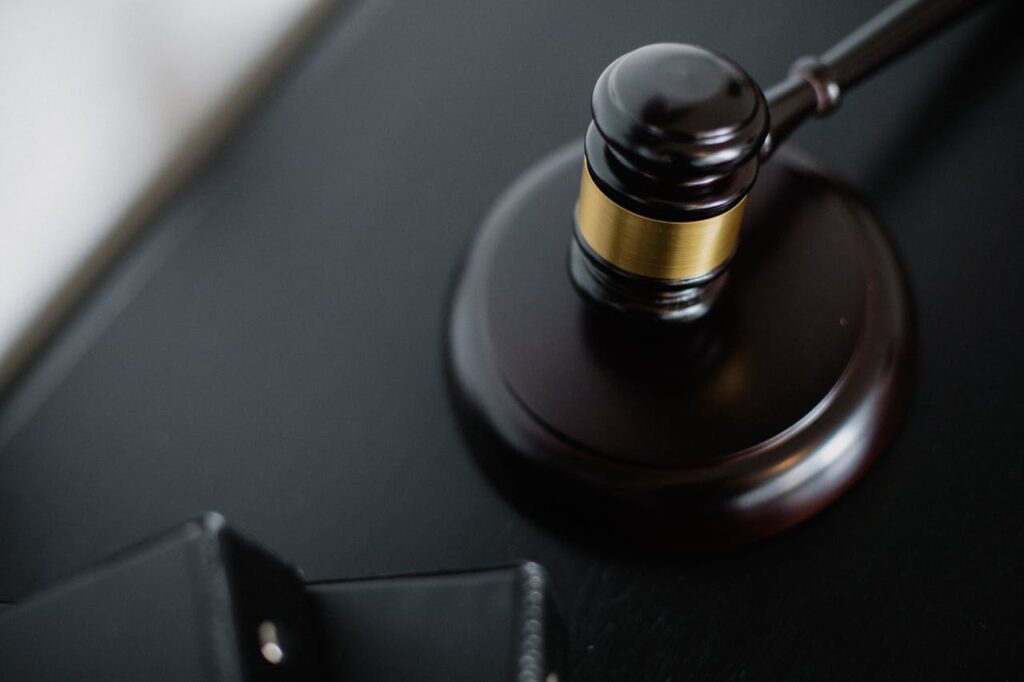 pexels-photo-5668481 Close-up Photo of a Wooden Gavel