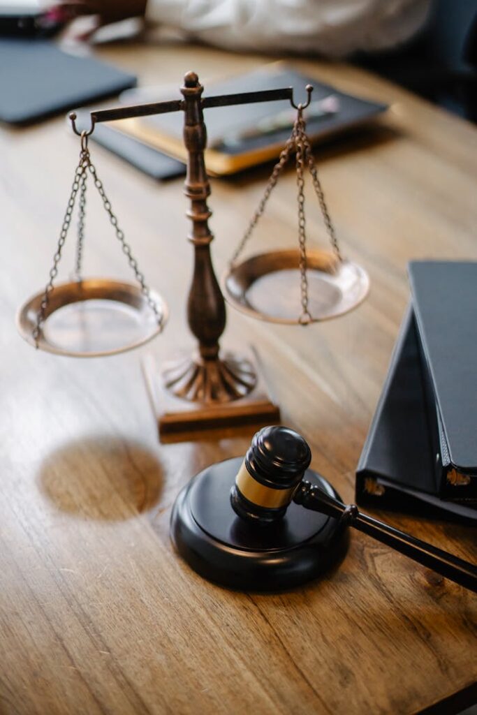 pexels-photo-5669619 Judges desk with gavel and scales